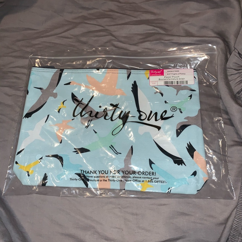 Thirty-One zipper pouch in bird pattern, brand new